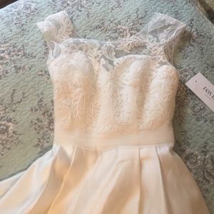 Unworn/NWT wedding gown from David’s bridal